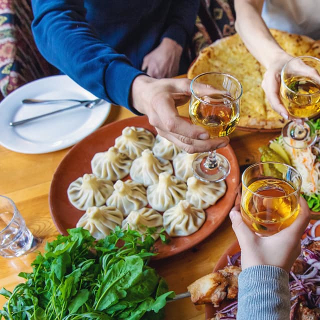A table of prepared dishes shared between diners